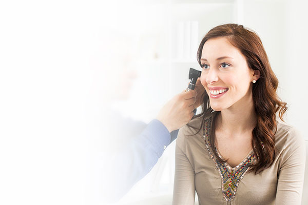 Woman during step two of a Hearing Test Examination