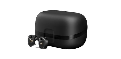 Starkey rechargeable hearing aids pictured with its charger